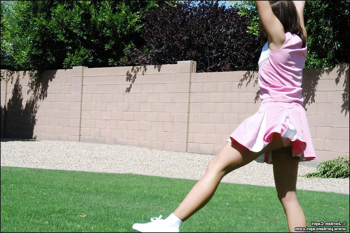 20P Pictures of teen hottie Jordan Capri doing a cheer outside
