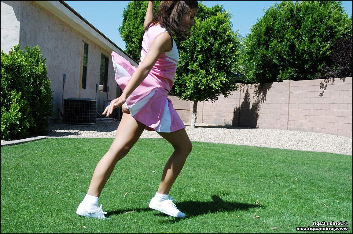20P Pictures of teen hottie Jordan Capri doing a cheer outside