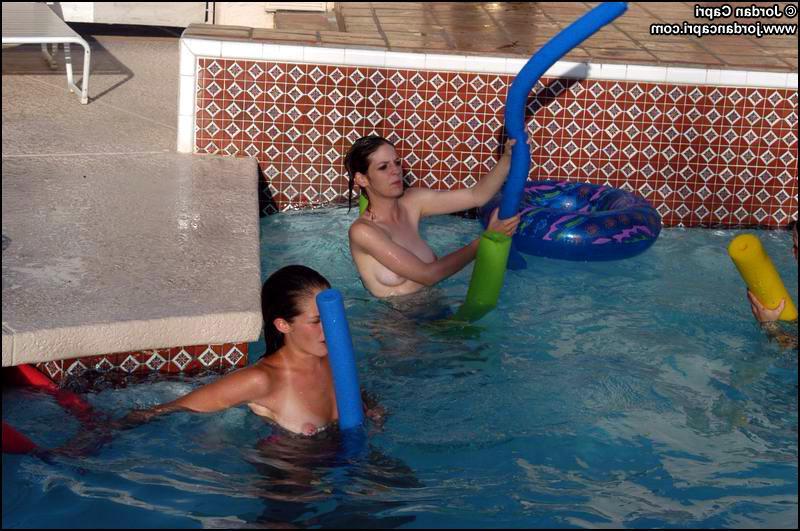 16P Lesbians teens play in a pool