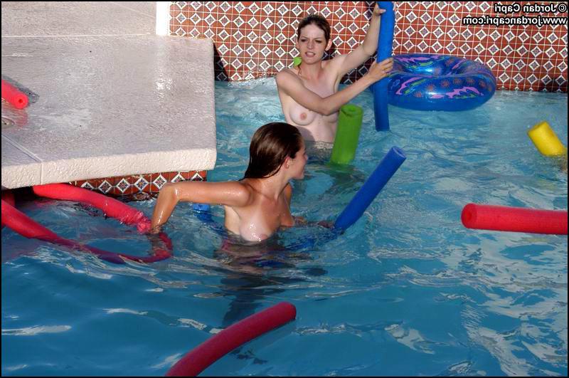 16P Lesbians teens play in a pool