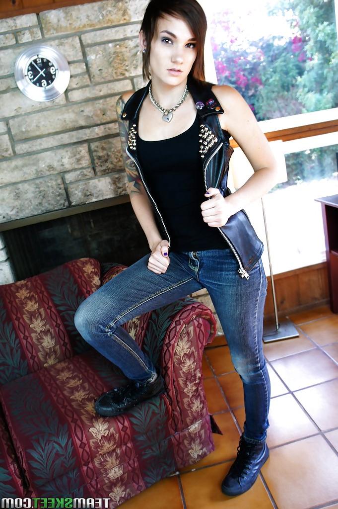 16P Slender tattooed babe in jeans gets naked and masturbates nicely