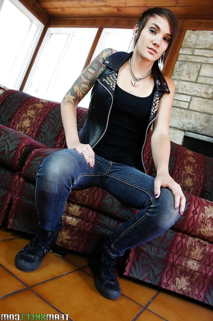 16P Slender tattooed babe in jeans gets naked and masturbates nicely