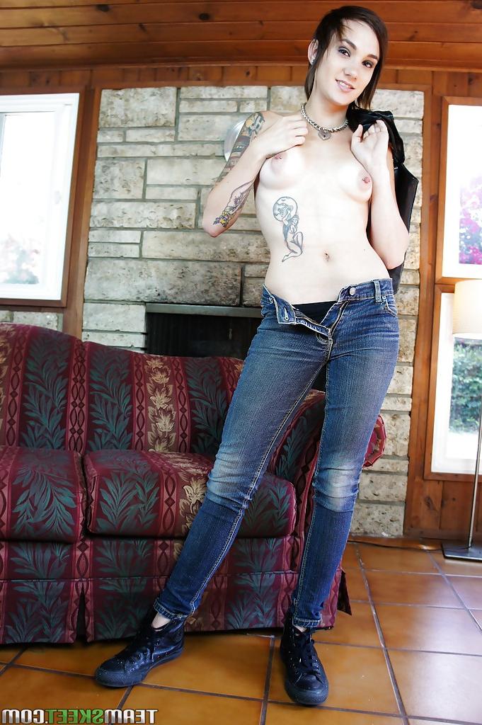16P Slender tattooed babe in jeans gets naked and masturbates nicely