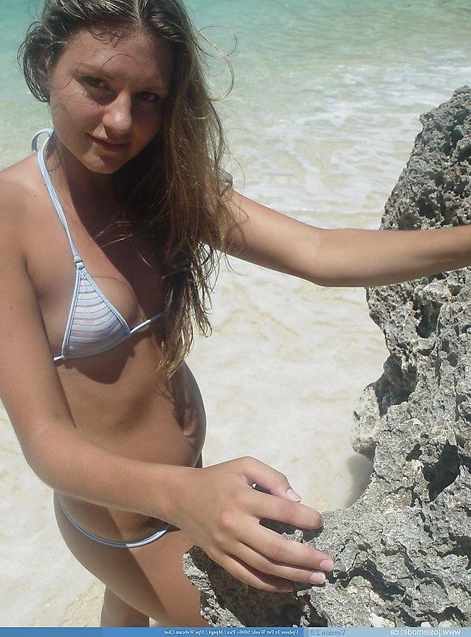 20P Pictures of Josie Model getting naked on a beach