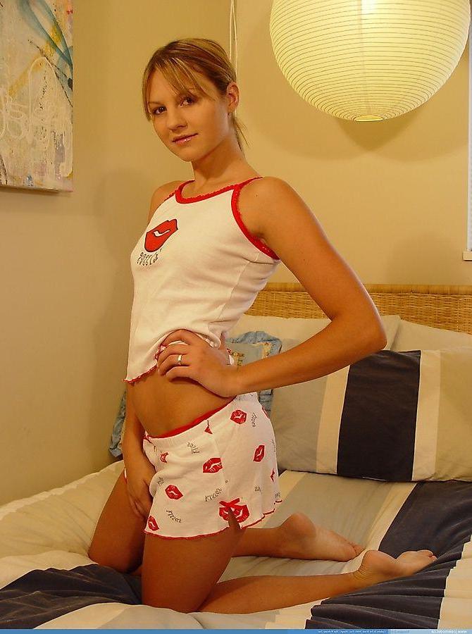20P Pictures of teen amateur Josie Model showing her perky titties