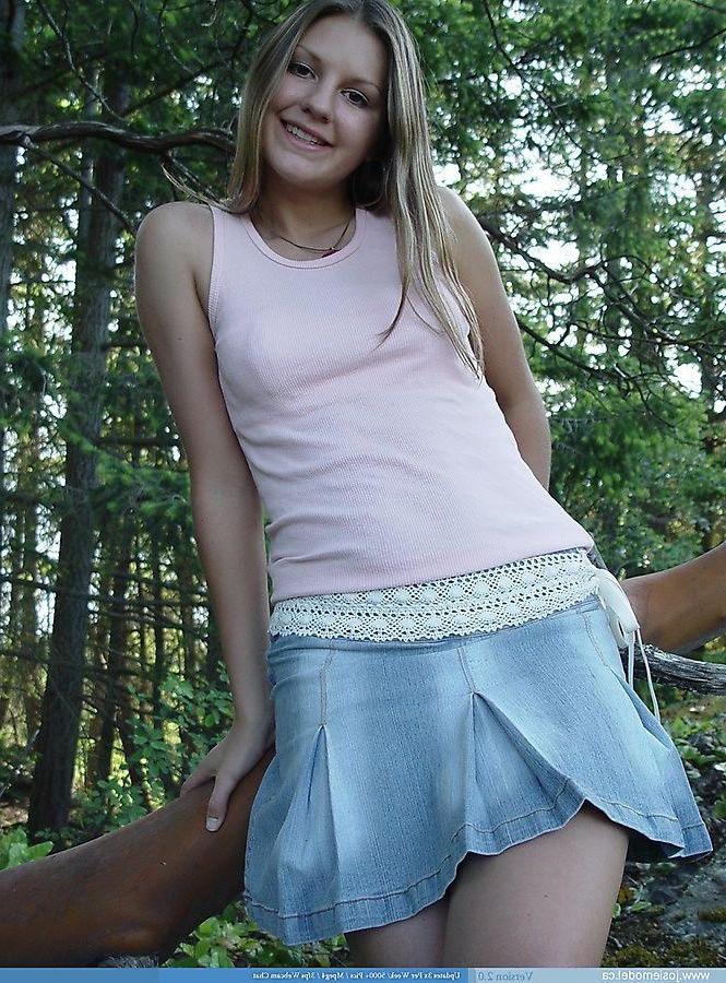 20P Pictures of Josie Model getting naked in the woods