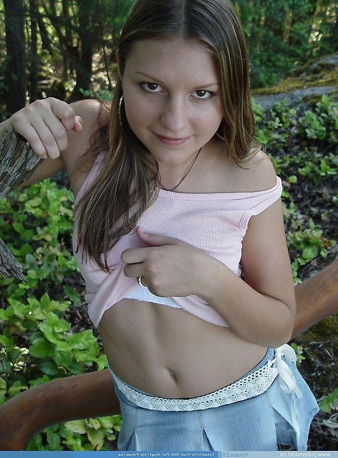 20P Pictures of Josie Model getting naked in the woods