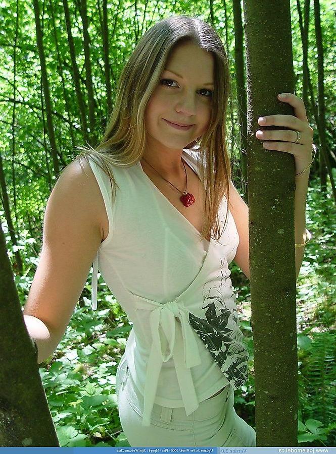20P Pictures of Josie Model showing her tits in the woods