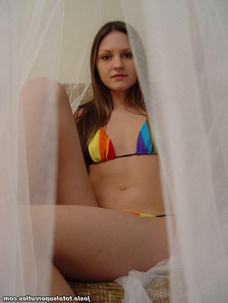20P Pictures of teen Josie Model taking off her bikini top