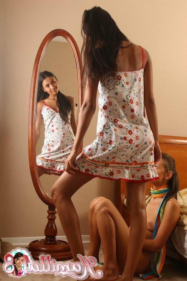 15P Tempting brunette teen model stripping