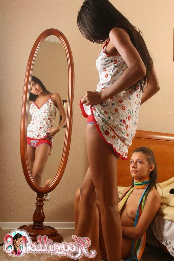 15P Tempting brunette teen model stripping