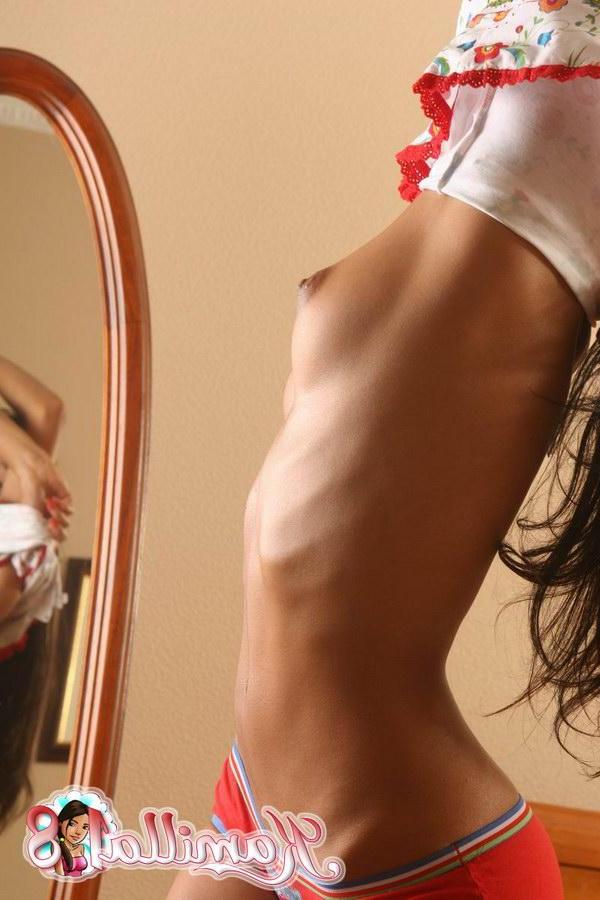15P Tempting brunette teen model stripping