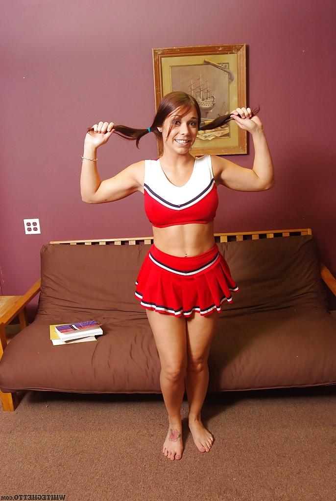 16P Bosomy cheerleader Beverly Hills stripping and spreading her legs