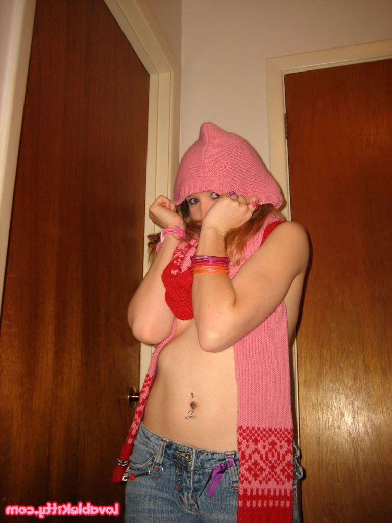 15P Pictures of Lovable Kitty giving you a hot striptease