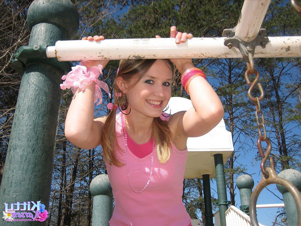 20P Pictures of teen star Kitty Karsen giving you some upskirt shots outside
