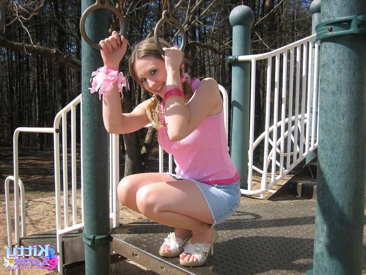 20P Pictures of teen star Kitty Karsen giving you some upskirt shots outside