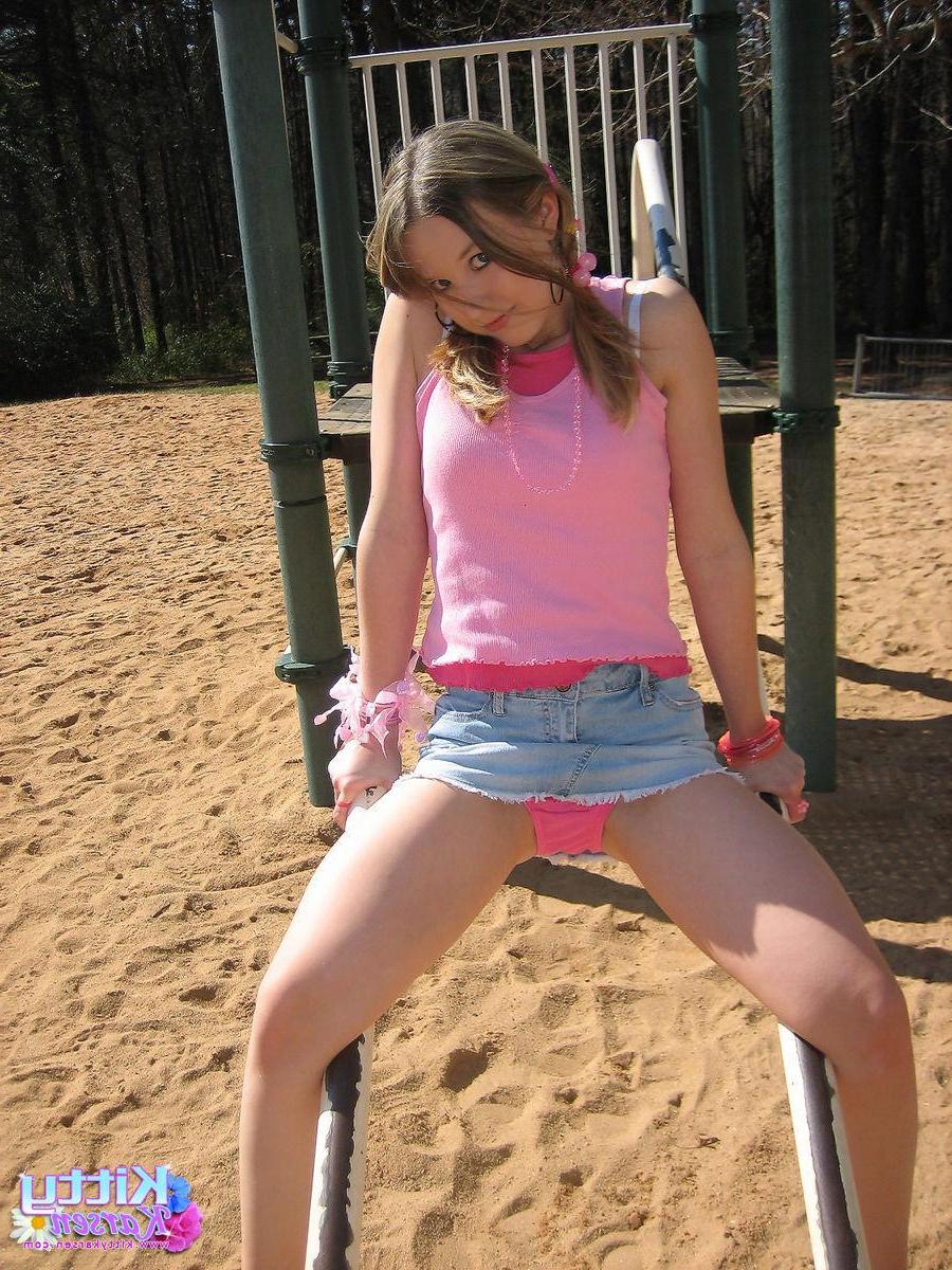 20P Pictures of teen star Kitty Karsen giving you some upskirt shots outside