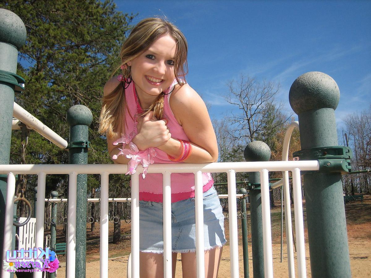 20P Pictures of teen star Kitty Karsen giving you some upskirt shots outside