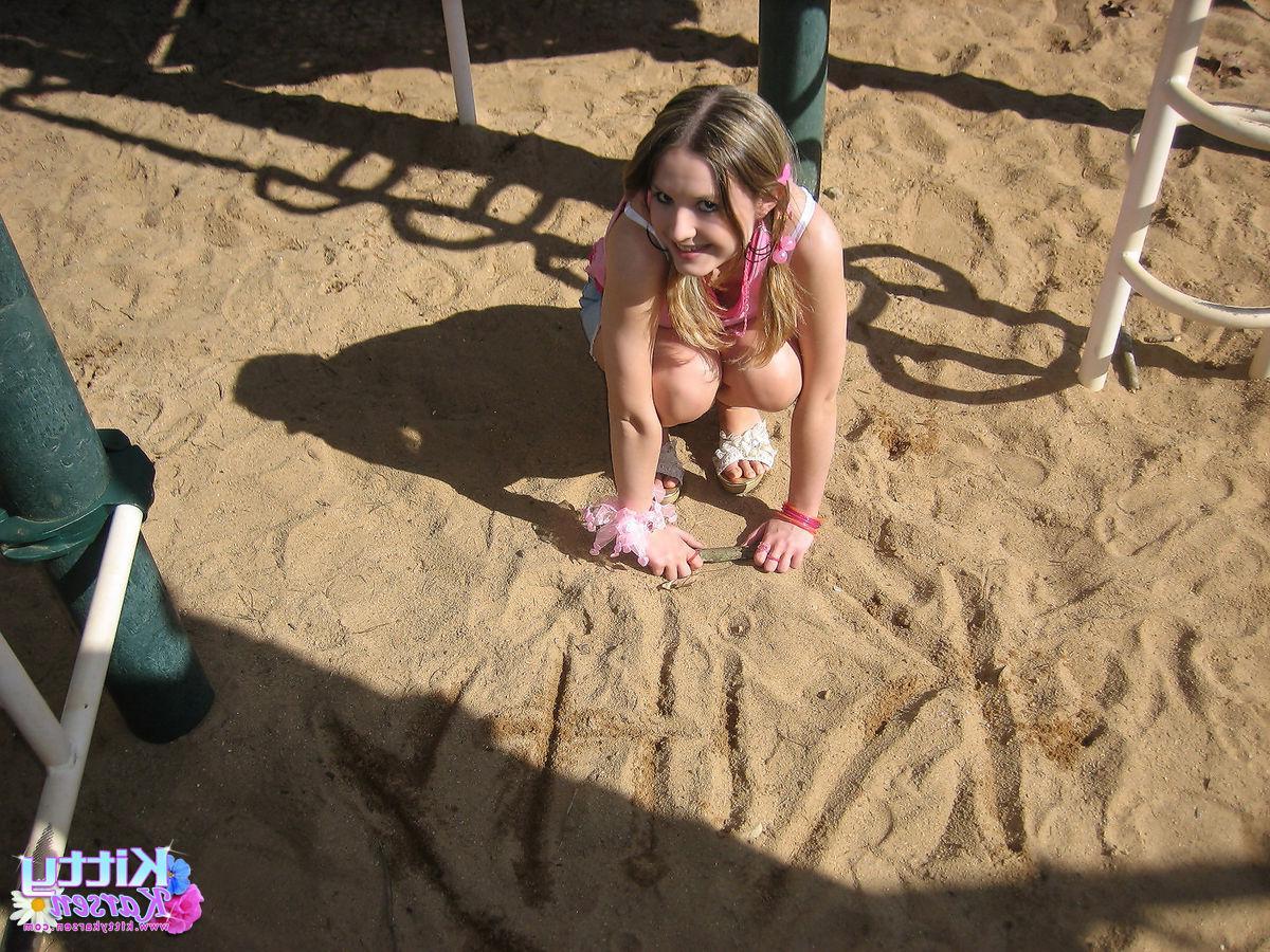 20P Pictures of teen star Kitty Karsen giving you some upskirt shots outside