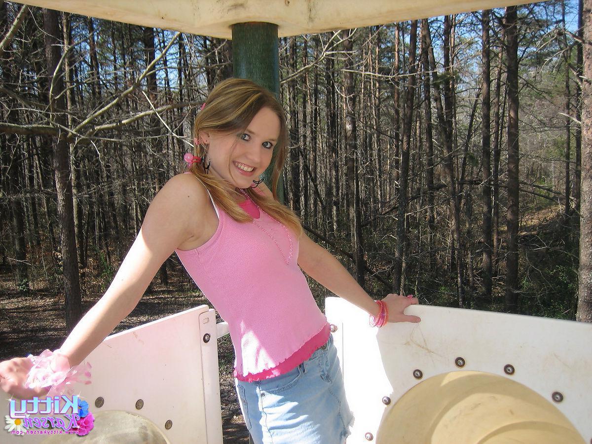 20P Pictures of teen star Kitty Karsen giving you some upskirt shots outside