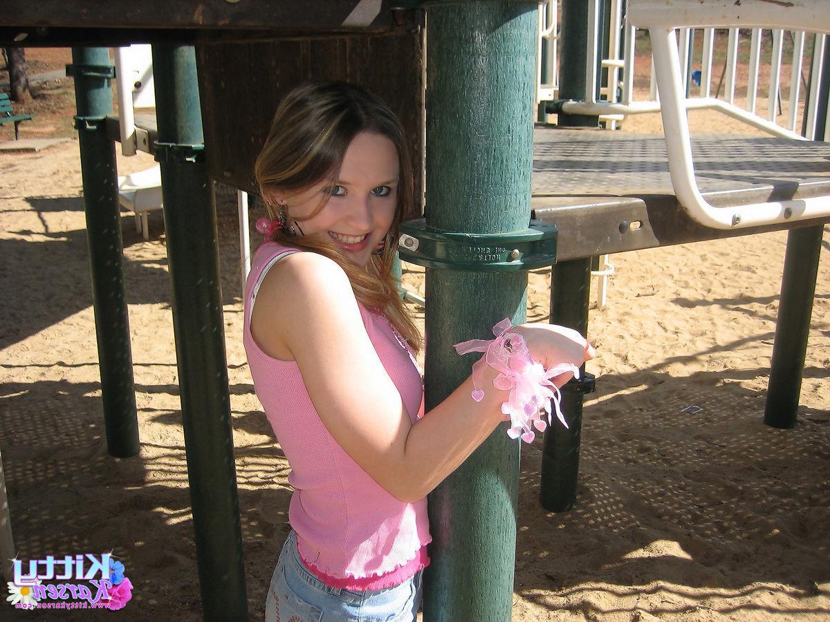 20P Pictures of teen star Kitty Karsen giving you some upskirt shots outside