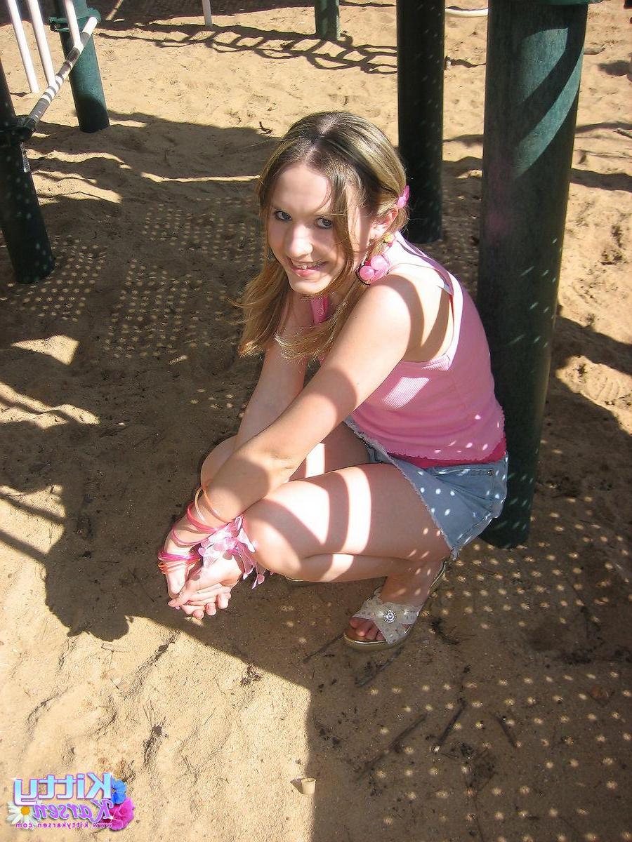 20P Pictures of teen star Kitty Karsen giving you some upskirt shots outside