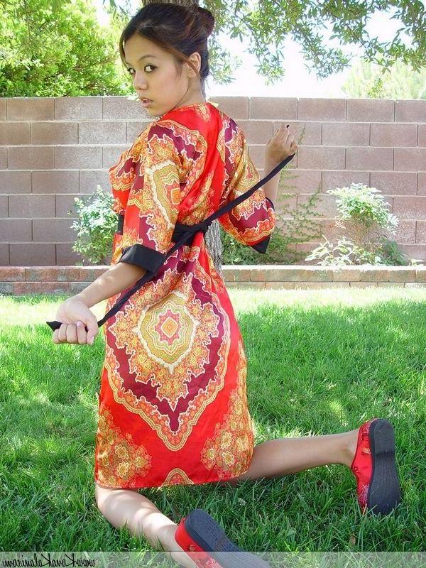 16P Pictures of Kona Kalani giving your cock a tease in the back yard