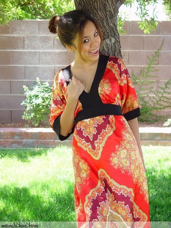 16P Pictures of Kona Kalani giving your cock a tease in the back yard