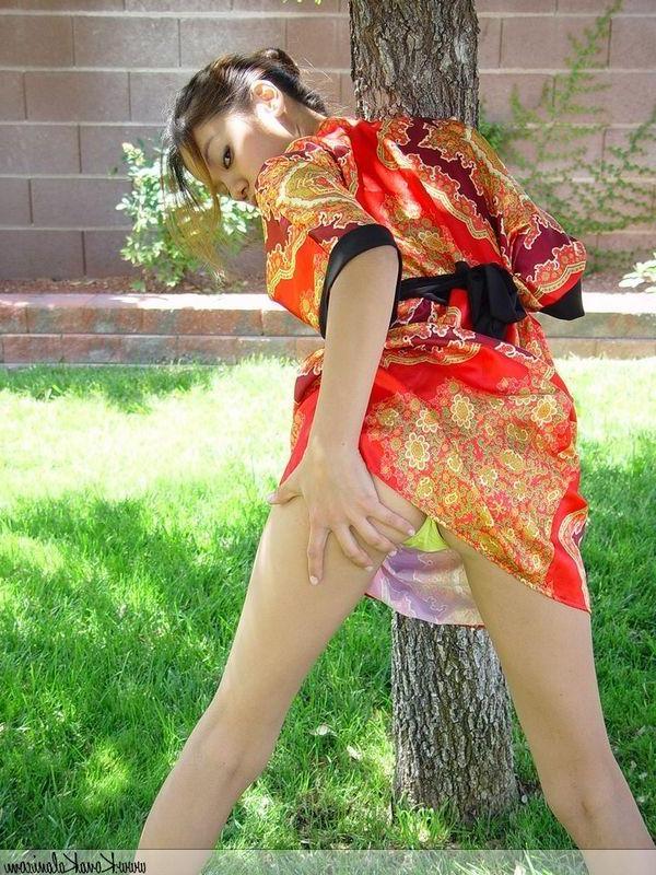 16P Pictures of Kona Kalani giving your cock a tease in the back yard