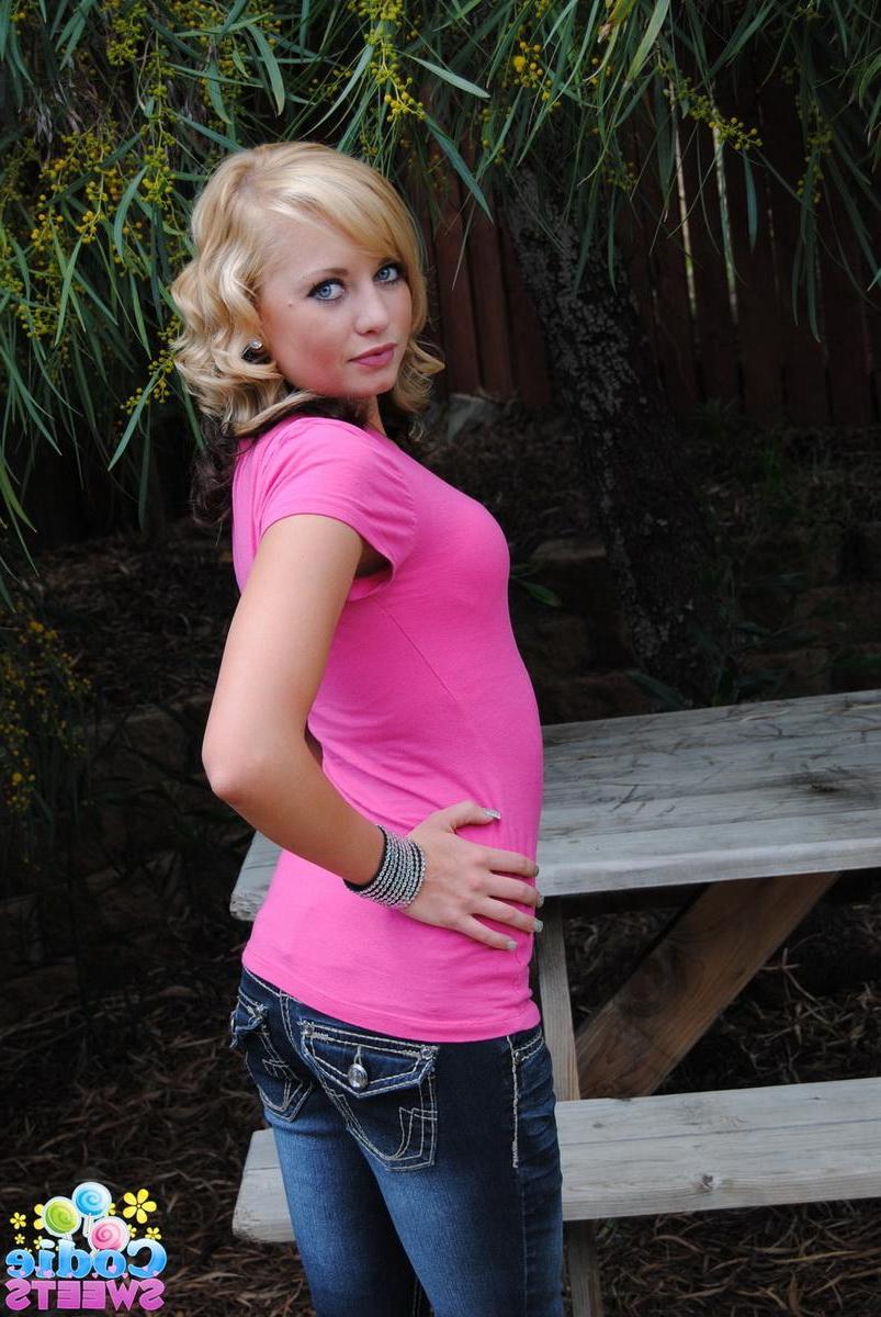 12P Teasing blonde Codie Sweets pulls down her tight jeans showing off her perfect teenage ass outdoors