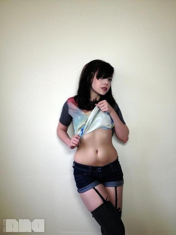 15P Pretty alt model Lilly Rose gives you a striptease next to the wall