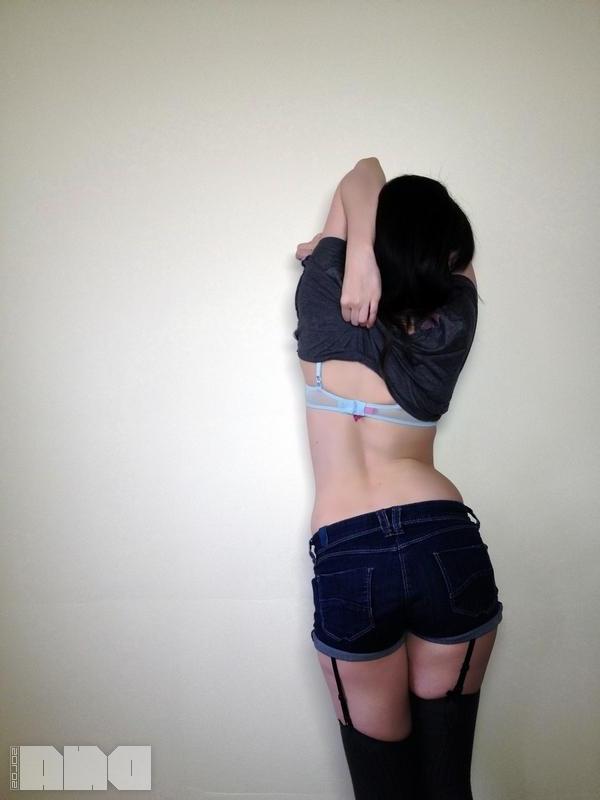 15P Pretty alt model Lilly Rose gives you a striptease next to the wall
