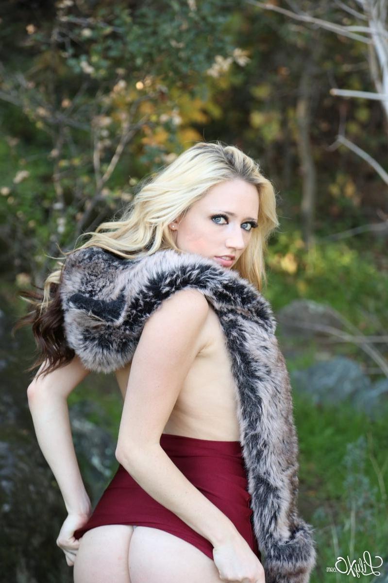 15P Blonde babe Lily Xo shows off her in her cranberry miniskirt