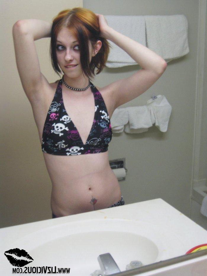 20P Pictures of Liz Vicious getting completely naked on the bathroom counter