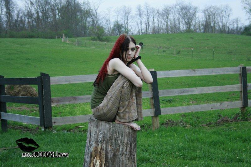 20P Liz Vicious strips slowly on a farm