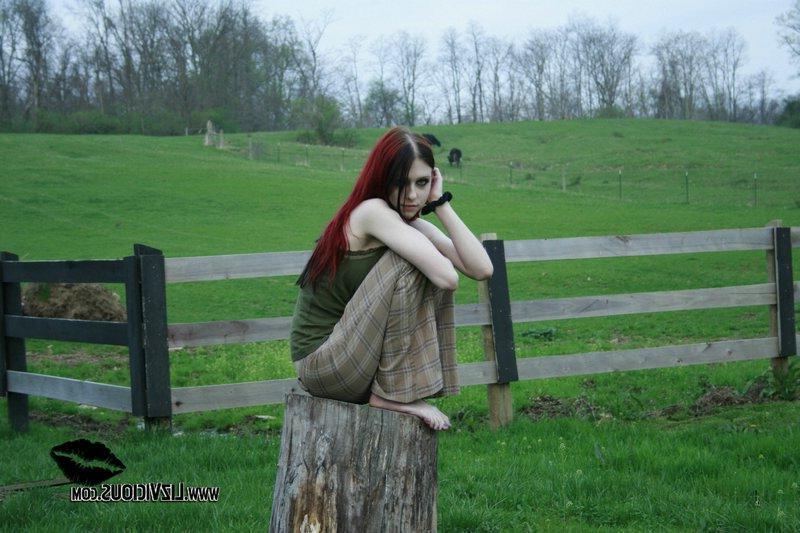 20P Liz Vicious strips slowly on a farm