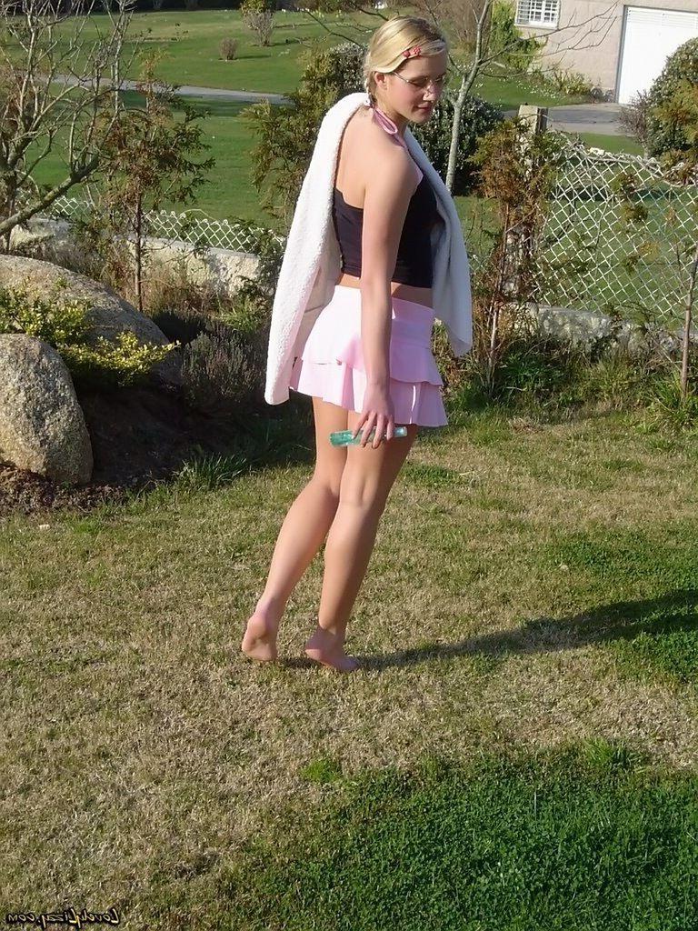 20P Pictures of teen amateur Lovely Lizzy having some sexy play time outside