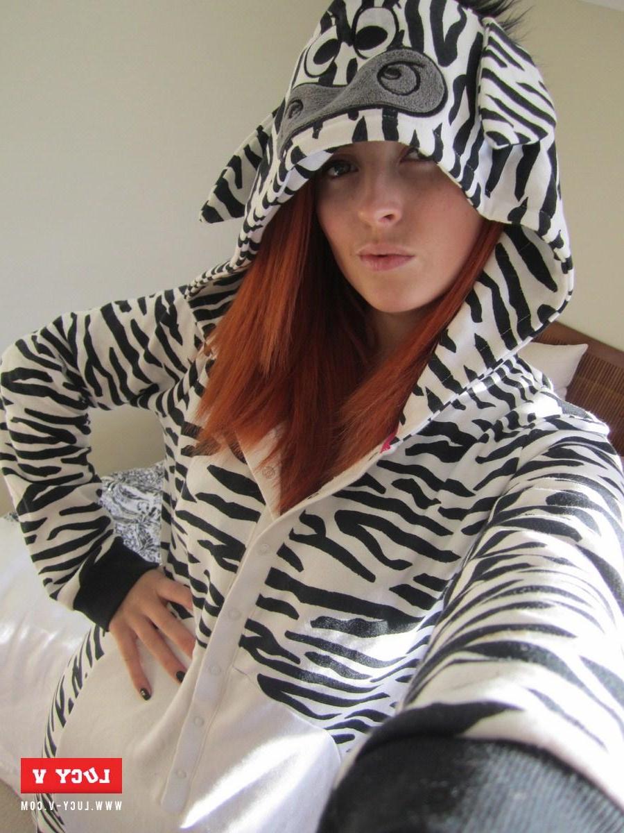 12P Busty model Lucy V strips from her striped onsie