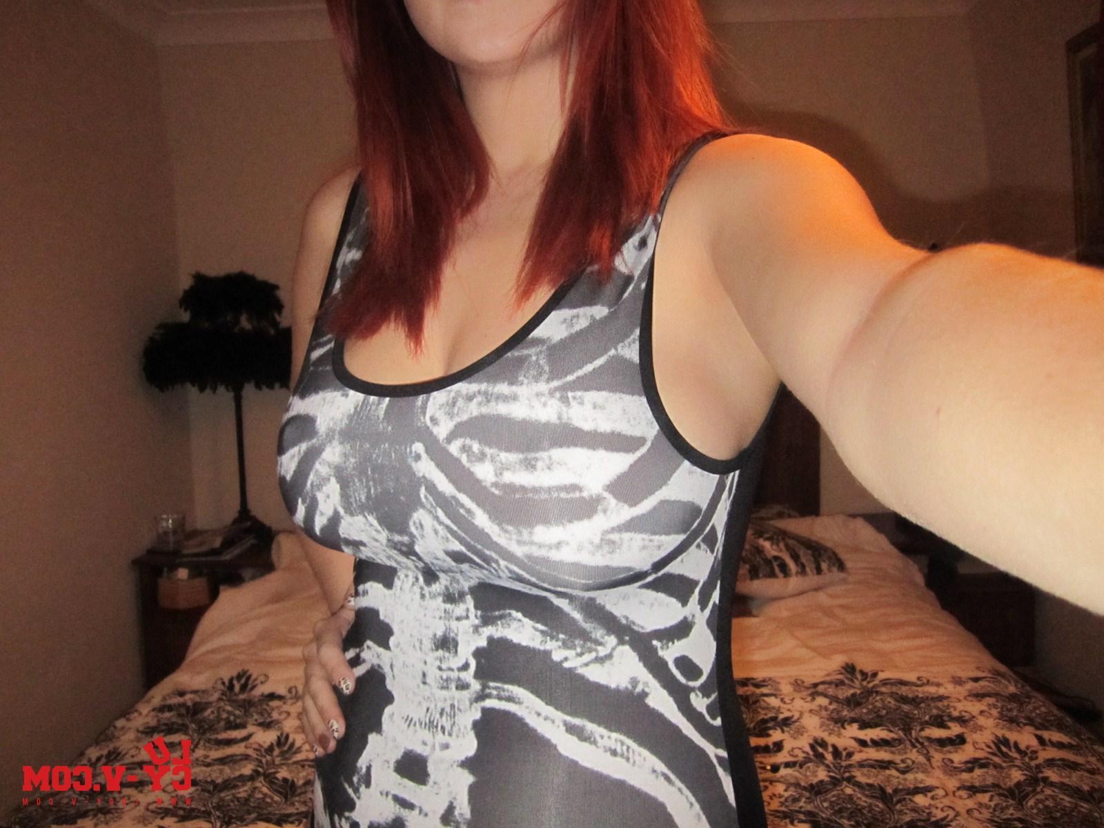 12P Lucy V pulls down the top of her tight one piece