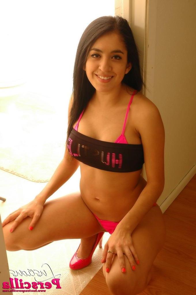 15P Pictures of Luscious Perscilla teasing in a skimpy thong