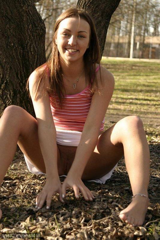 20P Pictures of Mandy\'s Diary giving you some upskirt shots of her pussy outside