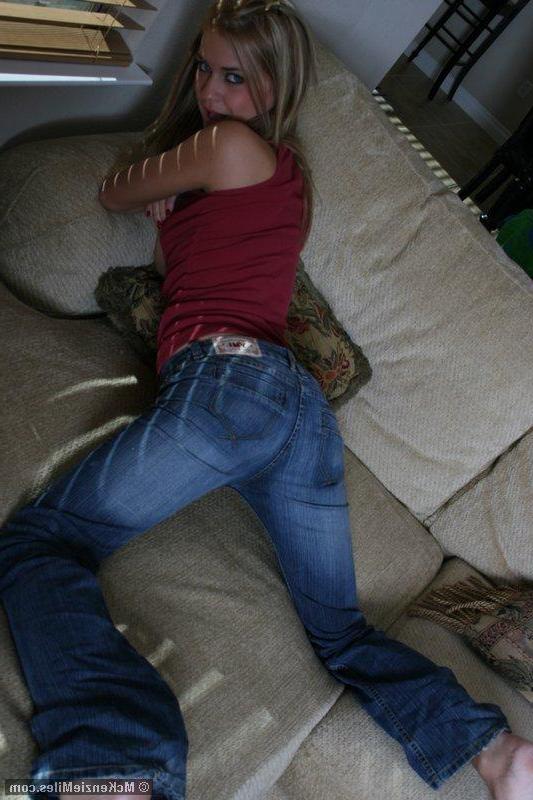 20P Screencaps of teen amateur McKenzie Miles sliding down her jeans so you can get