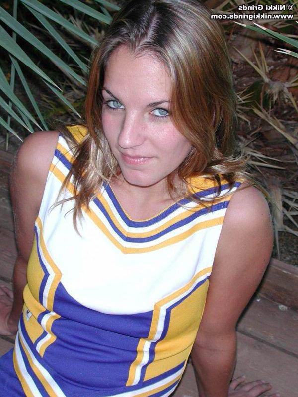 15P Nikki dressed up as a cheerleader