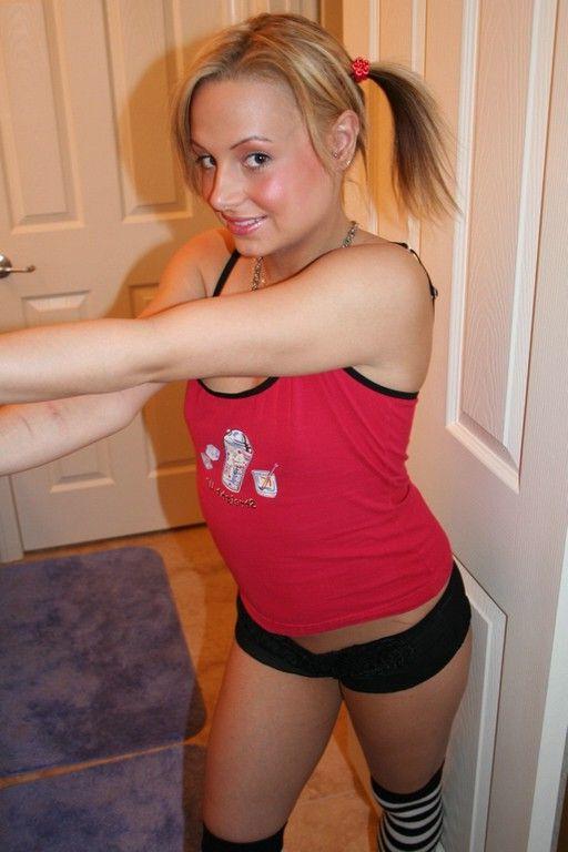 18P Pictures of Nikki Hillton getting naked in the bathroom