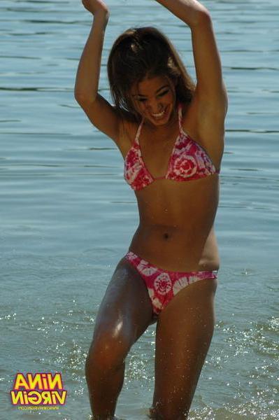 20P Pictures of teen chick Nina Virgin looking hot in a bikini