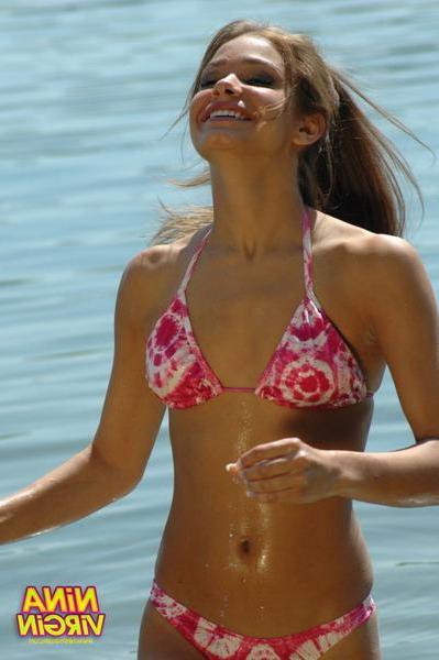 20P Pictures of teen chick Nina Virgin looking hot in a bikini