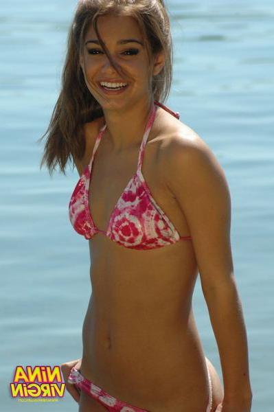 20P Pictures of teen chick Nina Virgin looking hot in a bikini