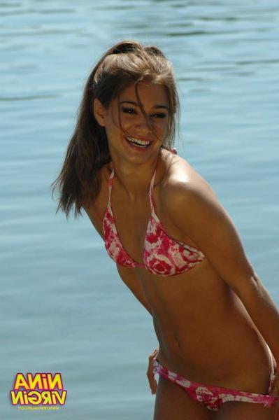 20P Pictures of teen chick Nina Virgin looking hot in a bikini