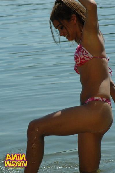 20P Pictures of teen chick Nina Virgin looking hot in a bikini