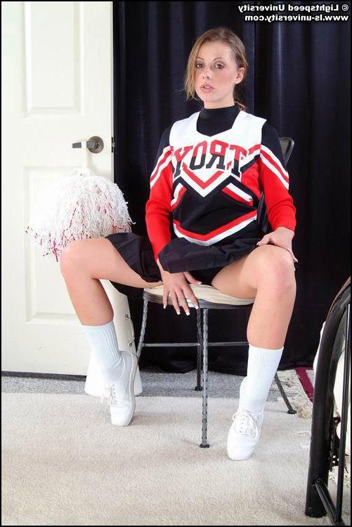 20P Pictures of a cheerleader stripping